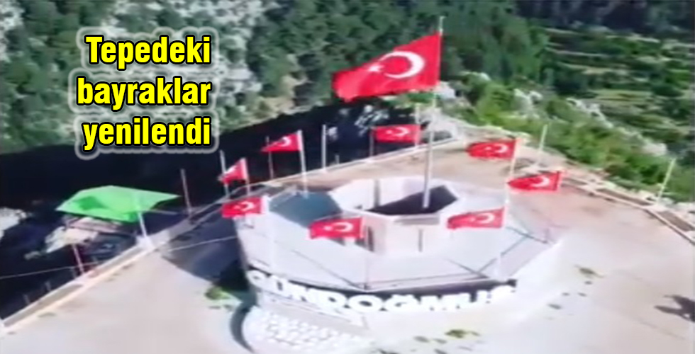 Tepedeki bayraklar yenilendi